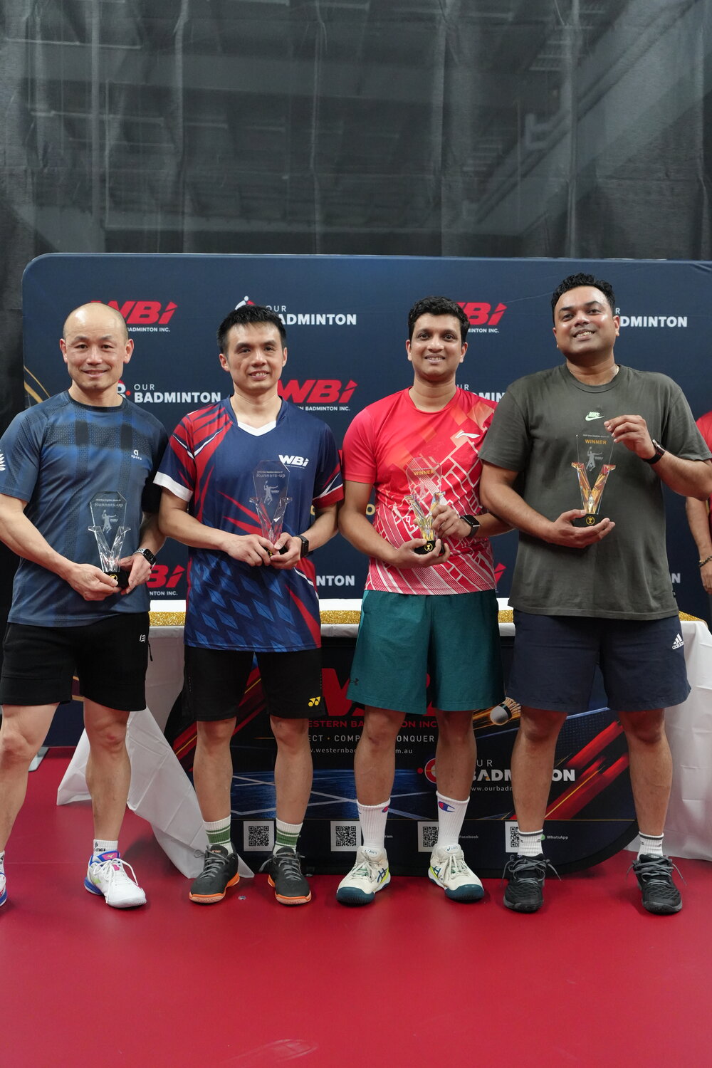 Men’s Doubles Above 40 winners and runners-up holding their trophies at the WBi Flagship Doubles Tournament 2026