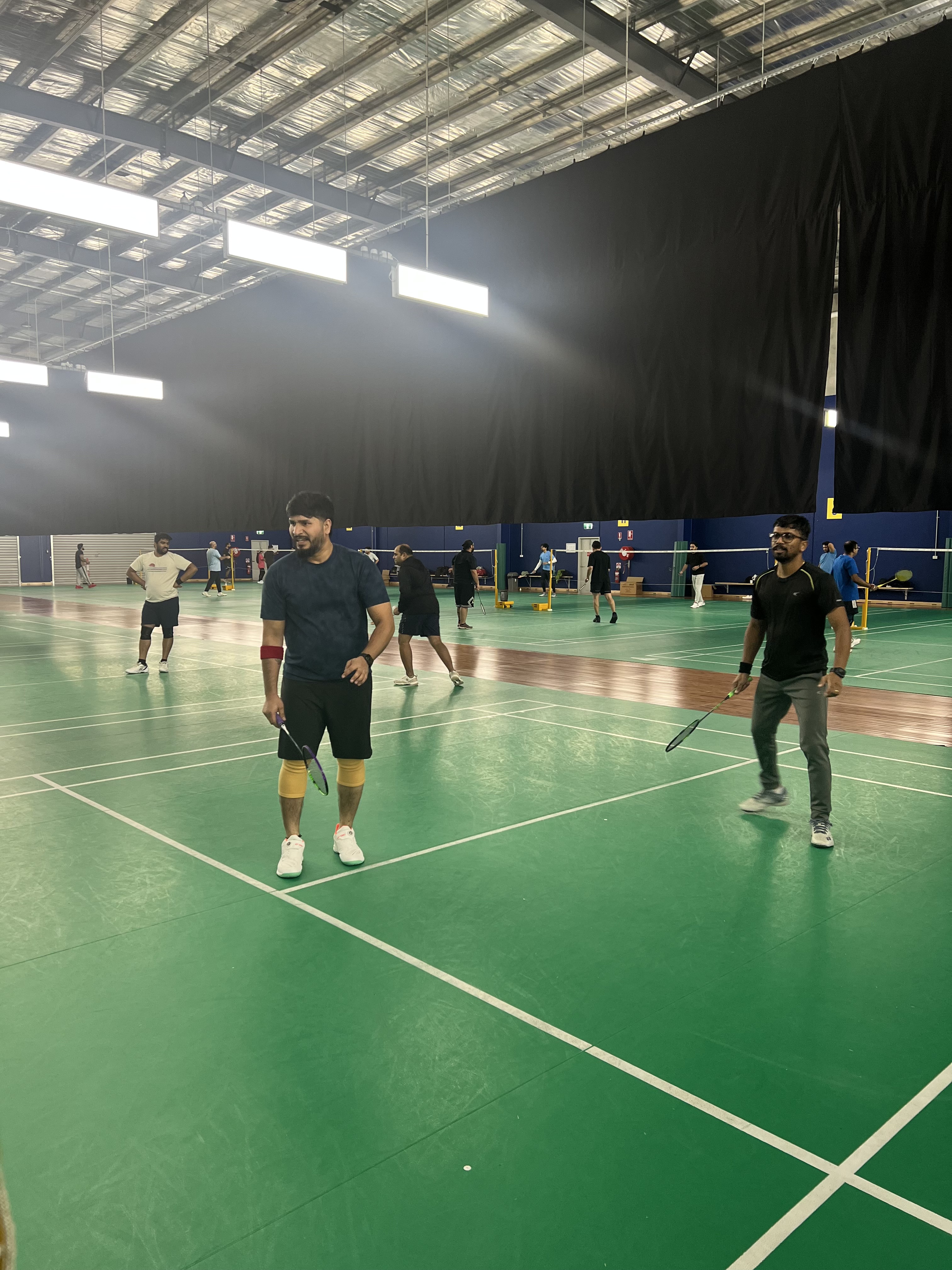 Competitive badminton doubles social game